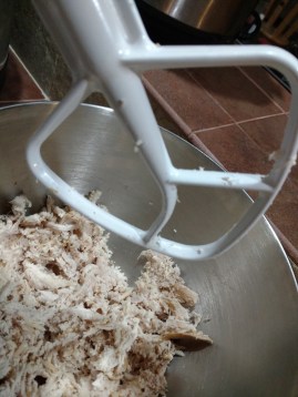 Shredded chicken in Kitchen Aid bowl