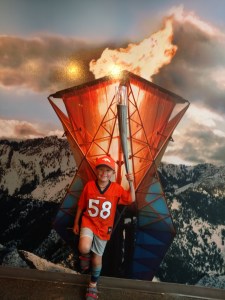 My son holding the Olympic torch