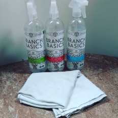 Branch Basics Cleaning bottles with a flat diaper for cleaning cloth